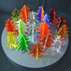 Sapins de Noël en plexiglas de couleur 3D. Objets publicitaires avec votre marque. Ils sont très appréciés des clients. A partir de 5 cm de haut.