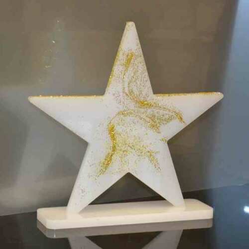 La stella in plexiglass opal decorata
